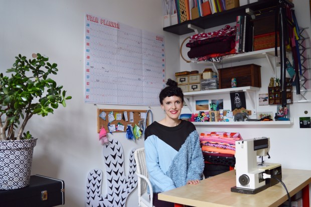 Rosie Martin - smiling at desk